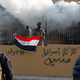 Iraqi security forces attempt to protect the US embassy in Baghdad during Tuesday’s protests.